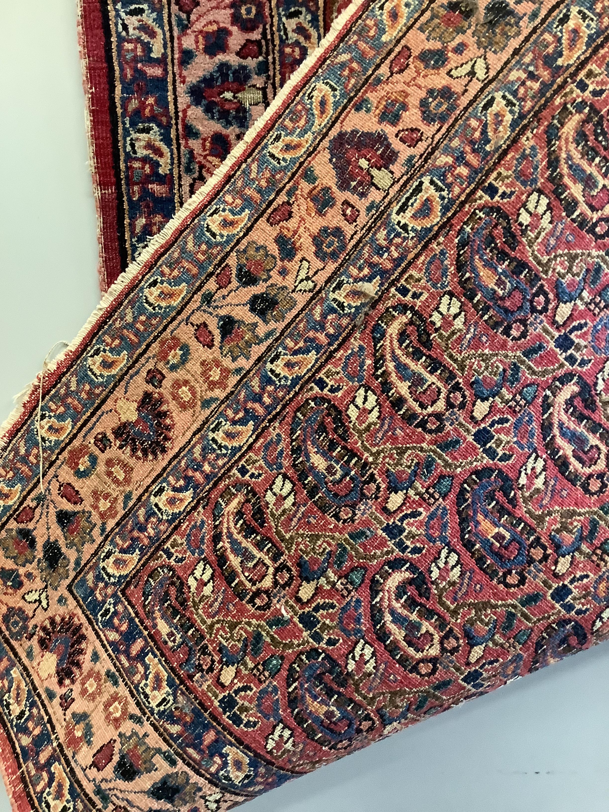A North West Persian red ground Boteh rug, 203 x 134cm